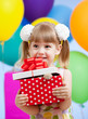 girl  with colorful balloons and gift