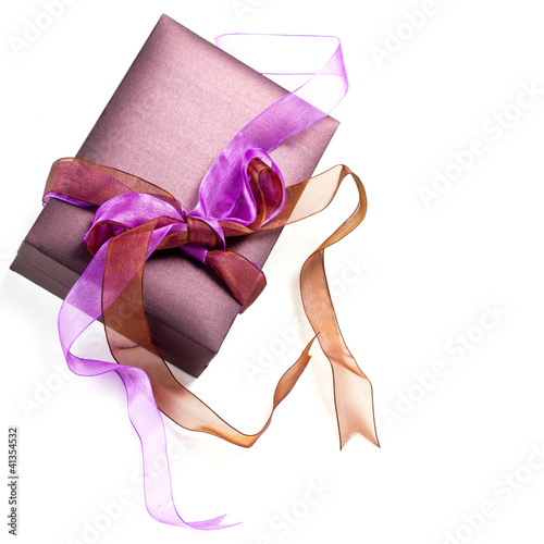 Photo: Beautiful purple gift box over white background Beautiful purple gift box over white background