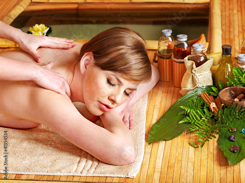 Foto: Woman getting massage. Woman getting massage.