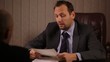 Boss communicate bad news to male worker
