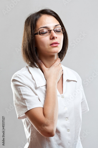 Photo: Sore throat young woman Sore throat young woman