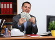 A young man with dollars in their hands A young man with dollars in their hands