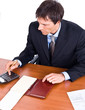 Businessman using a calculator