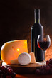 Still-life with cheese, grape and wine. Still-life with cheese, grape and wine.
