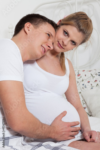 Photo: Happy pregnant family Happy pregnant family