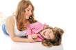 cheerful girl hugs her young mother. cheerful girl hugs her young mother.