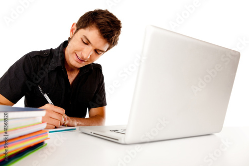 Photo: Male student with laptop Male student with laptop