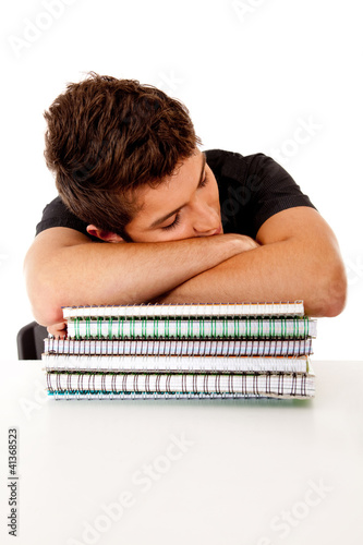 Photo: Male student fallen asleep Male student fallen asleep