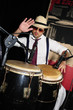 Photo: Cuban percussionist isolated on black Cuban percussionist isolated on black