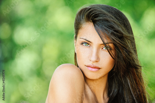 Photo: young beautiful woman with bare shoulders young beautiful woman with bare shoulders