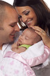 Mixed Race Young Couple with Newborn Baby