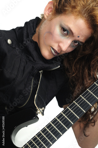 Photo: Funky female playing guitar Funky female playing guitar