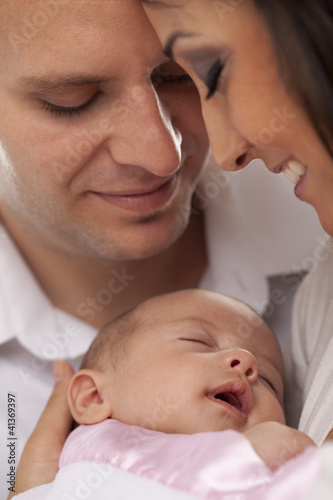 Photo: Mixed Race Young Couple with Newborn Baby Mixed Race Young Couple with Newborn Baby