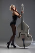 Young Woman In Lingerie With A Double Bass