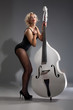 Young Woman In Lingerie With A Double Bass