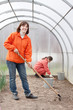 women works at greenhouse women works at greenhouse
