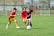 boys kicking ball