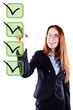 young beautiful  business woman checking on checklist boxes