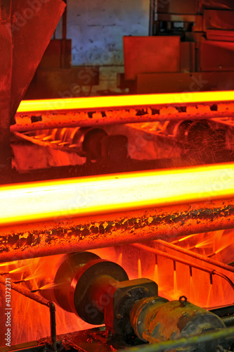 Photo: hot steel on conveyor hot steel on conveyor