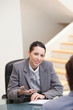 Businesswoman explaining something Businesswoman explaining something