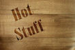 Foto: Hot stuff, ancient wooden background Hot stuff, ancient wooden background