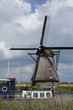 windmill and boat, kinderdijk, netherlands