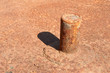 Rusty pipe welded to platform