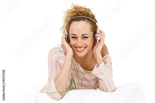 Foto: Junge Frau am Musik hören Junge Frau am Musik hören