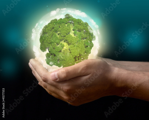 Photo: Little green world on hand Little green world on hand