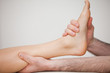 Foot being held by a doctor