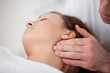 Close-up of woman being massaging by a physiotherapist