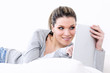 Foto: tablet on sofa at home tablet on sofa at home