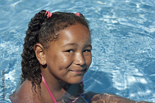 Photo: Young black girl in swimming pool Young black girl in swimming pool