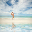 Happy fashion woman on the beach