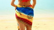 Video: Woman wearing pareo and bikini, standing at tropical beach Woman wearing pareo and bikini, standing at tropical beach