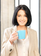 lovely businesswoman with mug