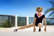 young woman doing stretching exercises outdoor young woman doing stretching exercises outdoor
