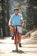 Senior man on country bike ride