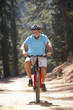 Senior man on country bike ride
