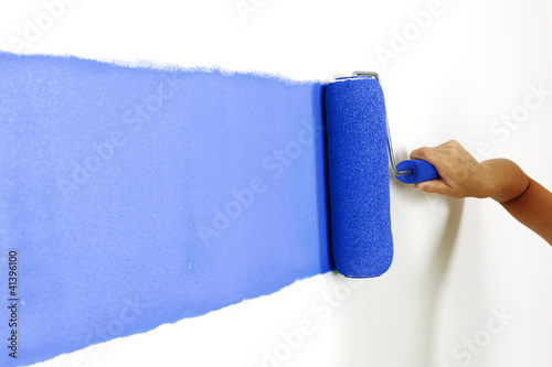 Photo: Roller with paint on the wall Roller with paint on the wall