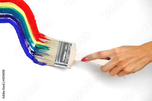Photo: rainbow paint on the white wall rainbow paint on the white wall