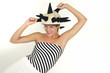 Caucasian model with crazy hat isolated