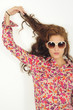 Caucasian female model with long hair and sunglasses