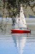 young boy and sail boat, Poland Solina Bieszczady region