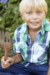 Young boy gardening