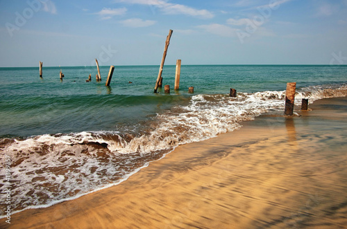 Photo: old jetty pillars in sea old jetty pillars in sea