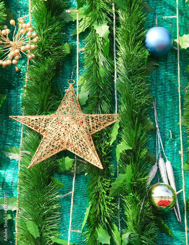 Photo: branch of fir-tree and ball and star branch of fir-tree and ball and star