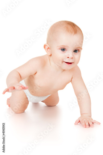 Photo: Smiling baby crawling forward, isolated on white Smiling baby crawling forward, isolated on white