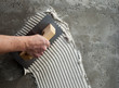 construction notched trowel with white cement