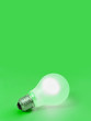 Photo: Lighting lamp on green background Lighting lamp on green background